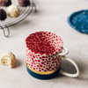 Festive Red Polka Dot Ceramic Coffee Mug with Blue and Gold Accents