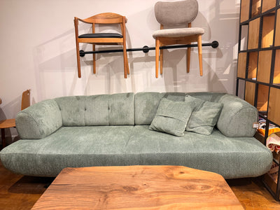 Green Sofa Bed With Wood Legs and Easy Flip Mechanism