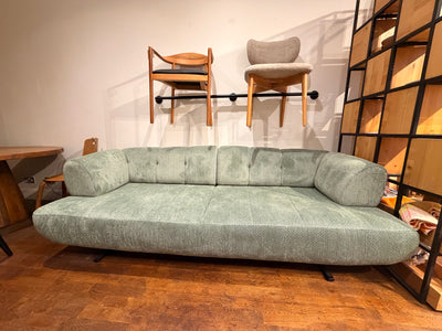 Green Sofa Bed With Wood Legs and Easy Flip Mechanism