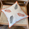 Embroidered Linen Cushion with Leaf Motif and Orange Trim