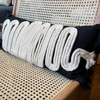 Black Linen Cushion with White Braided Knitted Detail