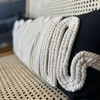 Black Linen Cushion with White Braided Knitted Detail