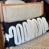 Black Linen Cushion with White Braided Knitted Detail